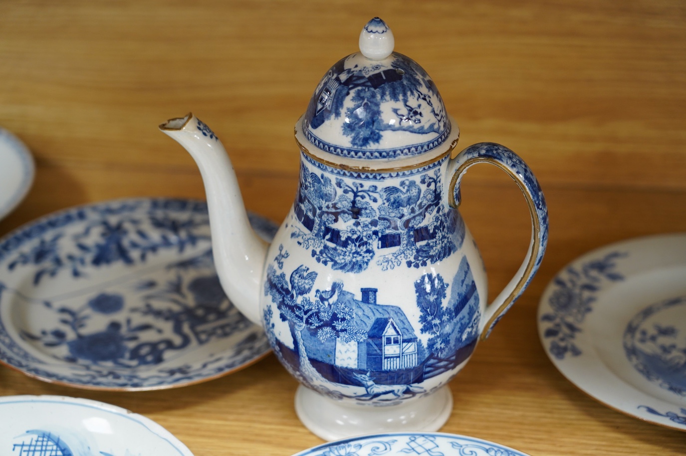 Ten various blue and white dishes including Chinese and Delft and a Staffordshire blue and white coffee pot and cover (11). Condition - fair